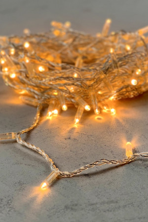 Светодиодная гирлянда с колпачком 100 экстра теплых белых LED ламп 10 м., 24В., прозрачный провод ПВХ, IP65, LTC (PST100CAP-10-1EWW)