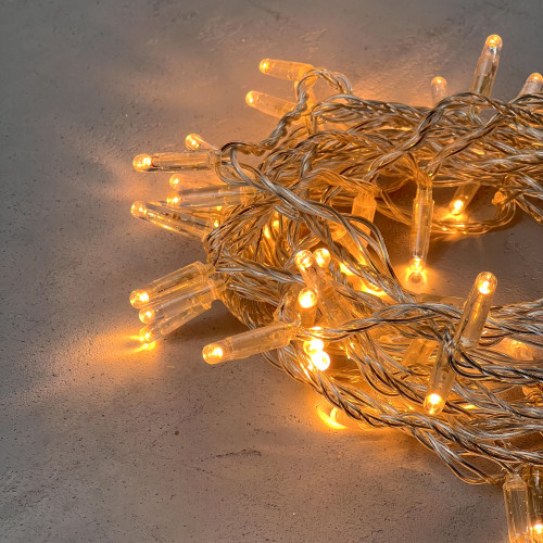 Светодиодная гирлянда с колпачком 100 экстра теплых белых LED ламп 10 м., 24В., прозрачный провод ПВХ, IP65, LTC (PST100CAP-10-1EWW)