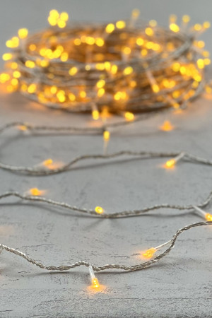 Светодиодная гирлянда с возможностью динамики 20 м., 200 желтых LED ламп, 24V., прозрачный силиконовый провод, IP65, Beauty Led (EST200-3W10-1Y)