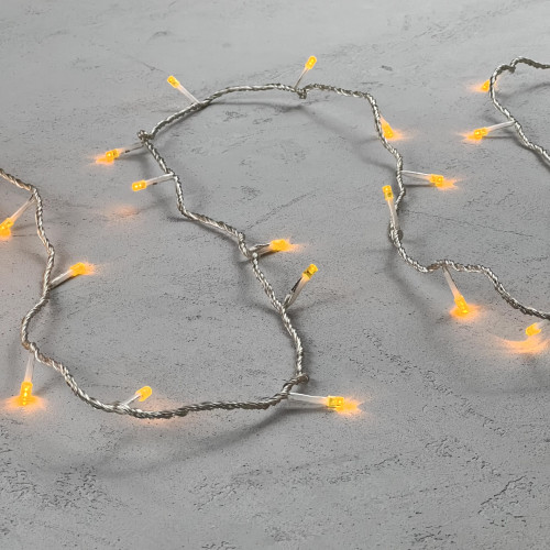 Светодиодная гирлянда с возможностью динамики 20 м., 200 желтых LED ламп, 24V., прозрачный силиконовый провод, IP65, Beauty Led (EST200-3W10-1Y)