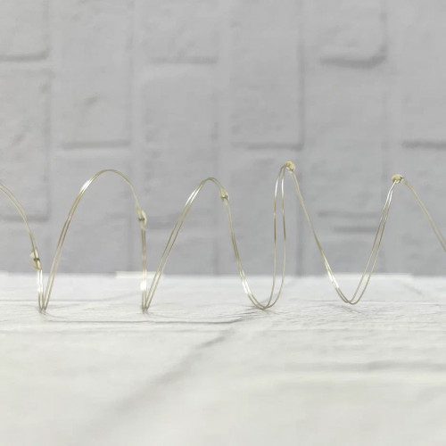 Гирлянда Роса на батарейках 20 теплых белых ламп, 190 см., серебряный провод, Christmas DeLuxe (87407)