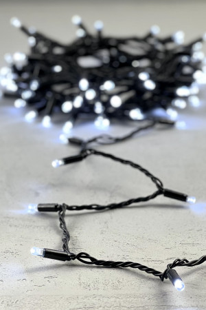 Светодиодная гирлянда с колпачком 100 холодных белых LED ламп 10 м., 24В., черный провод ПВХ, IP65, LTC (PST100CAP-11-1W)