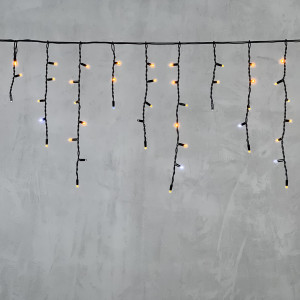 Светодиодная бахрома с колпачком 3,1*0,5 м., 120 желтых белых LED ламп, мерцание, каучуковый черный провод, LTC (LL120BLW-1-2Y)