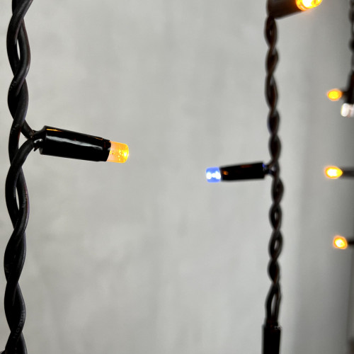 Светодиодная бахрома с колпачком 3,1*0,5 м., 120 желтых белых LED ламп, мерцание, каучуковый черный провод, LTC (LL120BLW-1-2Y)