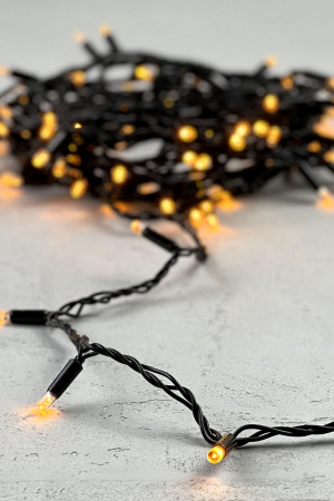 Светодиодная гирлянда с колпачком 100 желтых LED ламп 10 м., 24В., черный провод ПВХ, IP65, LTC (PST100CAP-11-1Y)