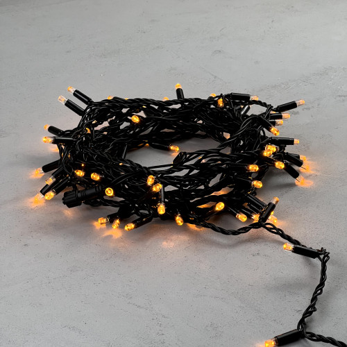 Светодиодная гирлянда с колпачком 100 желтых LED ламп 10 м., 24В., черный провод ПВХ, IP65, LTC (PST100CAP-11-1Y)