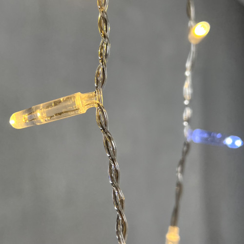  Светодиодная  бахрома с колпачком 4,9 x 0,5 м тепло-белая с мерцанием белого диода 220В, 200 LED, провод прозрачный ПВХ, IP65 (PIL200BLWCAP-10-2WW)