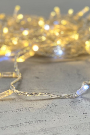 Светодиодная гирлянда с колпачком 100 теплых белых LED ламп 10 м., мерцание, 24В., прозрачный провод ПВХ, IP65, LTC (PST100BLWCAP-10-1WW)