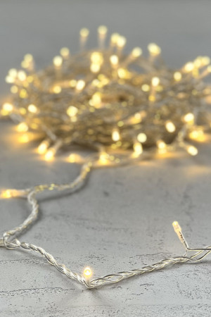 Светодиодная нить 100 теплых белых LED ламп, 10 м., 24В., прозрачный провод ПВХ, LTC (PST100-10-1WW)