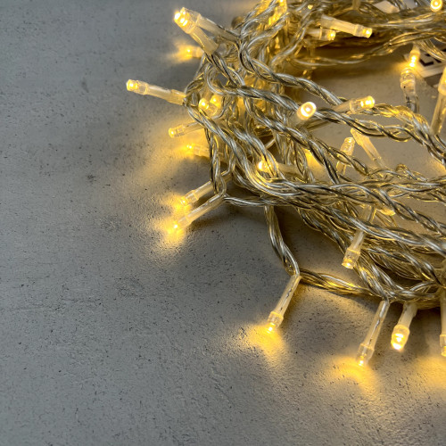 Светодиодная нить 100 теплых белых LED ламп, 10 м., 24В., прозрачный провод ПВХ, LTC (PST100-10-1WW)