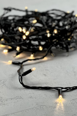 Светодиодная гирлянда с колпачком 100 теплых белых LED ламп 10 м., мерцание каждого диода, 24В., черный провод ПВХ, IP65, LTC (PST100ABLCAP-11-1WW)