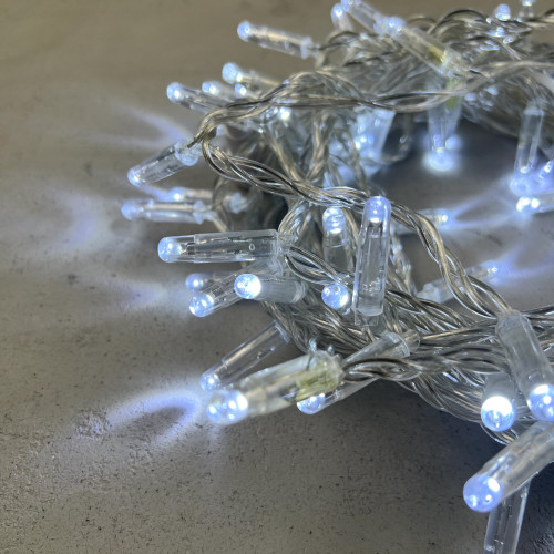 Светодиодная гирлянда с колпачком 100 холодных белых LED ламп 10 м., 24В., прозрачный провод ПВХ, IP65, LTC (PST100CAP-10-1W)