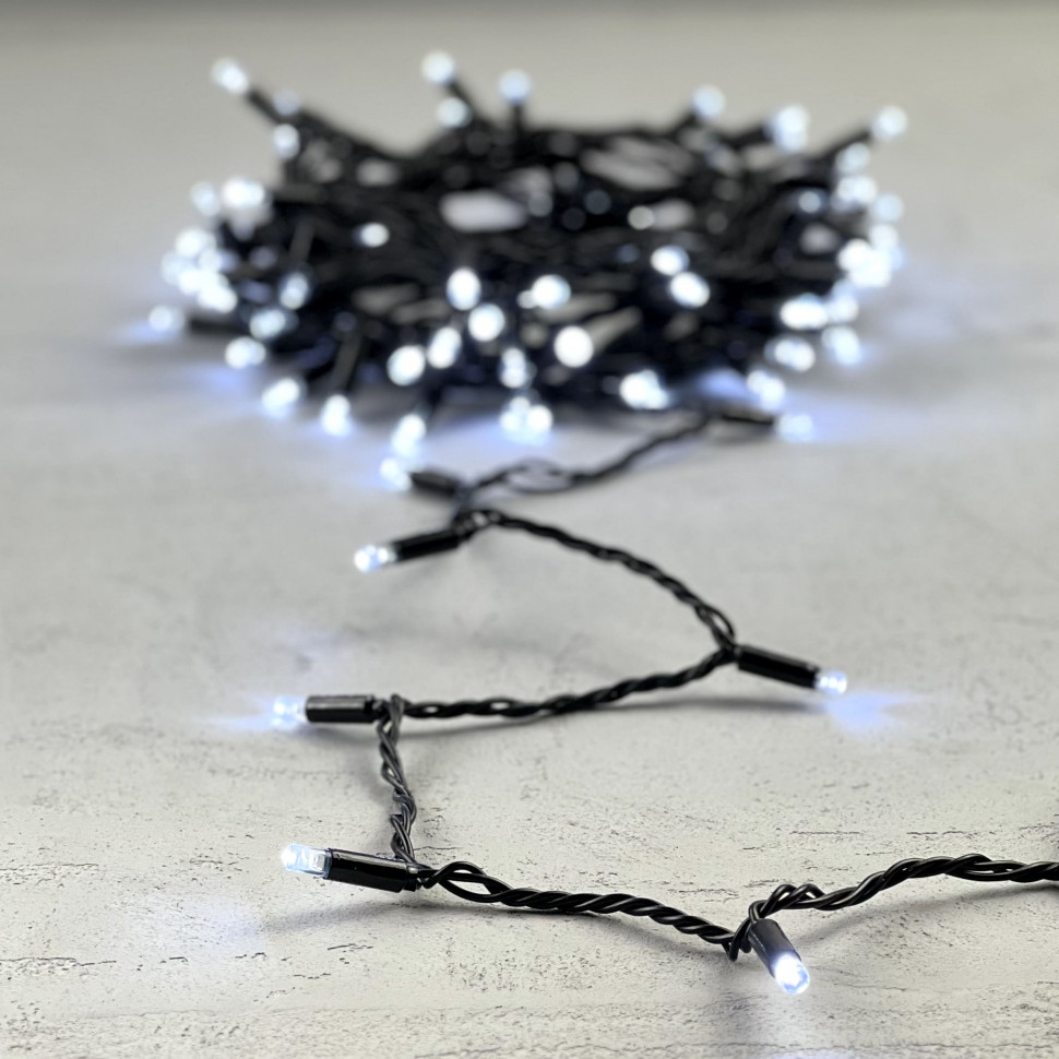 Светодиодная гирлянда с колпачком 100 холодных белых LED ламп 10 м., 220-230 В., черный провод ПВХ, IP65, LTC (PST100CAP-11-2W)