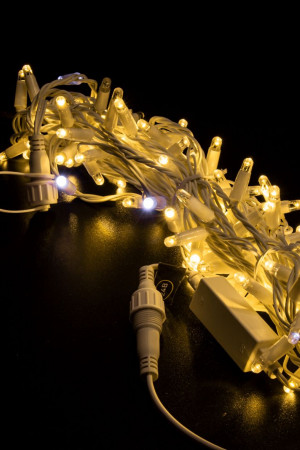 Светодиодная нить 100 теплых белых LED ламп, 10 м., 24В, мерцание, белый резиновый провод 2,3 мм., Teamprof (TPF-S10CF-24V-SRW/WW)