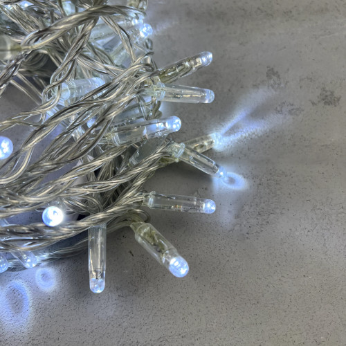 Светодиодная гирлянда с колпачком 100 холодных белых LED ламп 10 м., мерцание, 220-230 В., прозрачный провод ПВХ, IP65, LTC (PST100BLWCAP-10-2W)