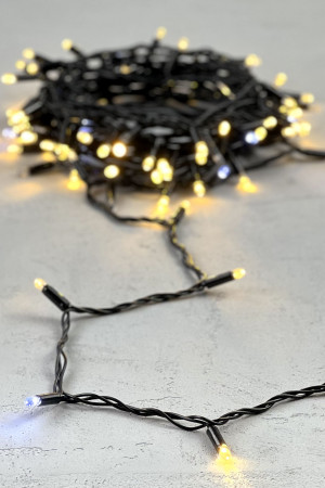 Светодиодная гирлянда с колпачком 100 экстра теплых белых LED ламп 10 м., мерцание, 220-230 В., черный провод ПВХ, IP65, LTC (PST100BLWCAP-11-2WW)