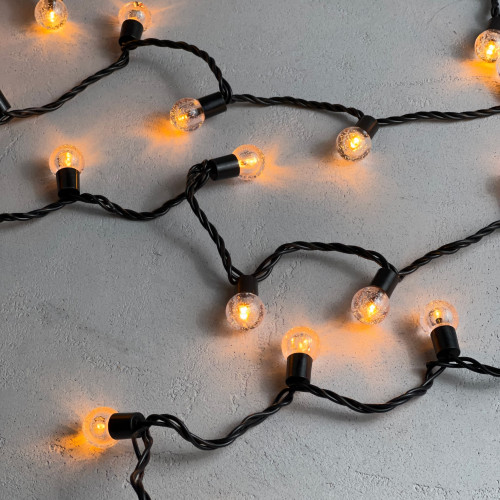 Светодиодная гирлянда шарики Пузырьки 10 м., 220V., 100 желтых LED ламп 23 мм., коннектор, черный ПВХ, LTC (PCS-100B-Y)