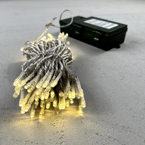 Светодиодная гирлянда 10 м., 3 батарейки типа D 4.5V, 100 LED ламп цвета шампань, таймер, прозрачный провод, LTC (EST100-4W10-8CH)