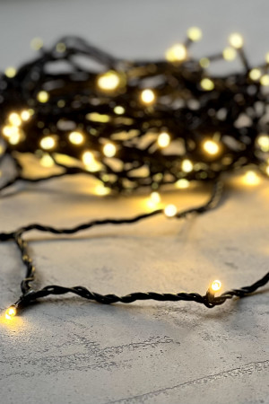 Светодиодная нить 100 теплых белых LED ламп, 10 м., 24В, черный провод ПВХ, LTC (PST100-11-1WW)