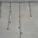 Светодиодная бахрома с колпачком 3,1*0,5 м., 120 желтых LED ламп, мерцание, черный провод ПВХ, IP65, LTC (PIL120BLWCAP-11-2Y)