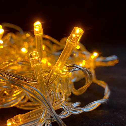 Занавес с мерцающим диодом 2*2 м., 220V, 240 желтых LED ламп, прозрачный провод, Winner Light (Y.03.5T.240+)