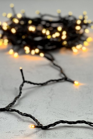 Светодиодная нить 100 экстра теплых белых LED ламп, 10 м., 24В, черный провод ПВХ, LTC (PST100-11-1EWW)