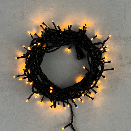 Светодиодная нить 100 экстра теплых белых LED ламп, 10 м., 24В, черный провод ПВХ, LTC (PST100-11-1EWW)