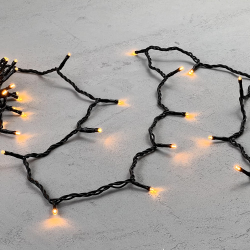 Светодиодная нить 100 экстра теплых белых LED ламп, 10 м., 24В, черный провод ПВХ, LTC (PST100-11-1EWW)