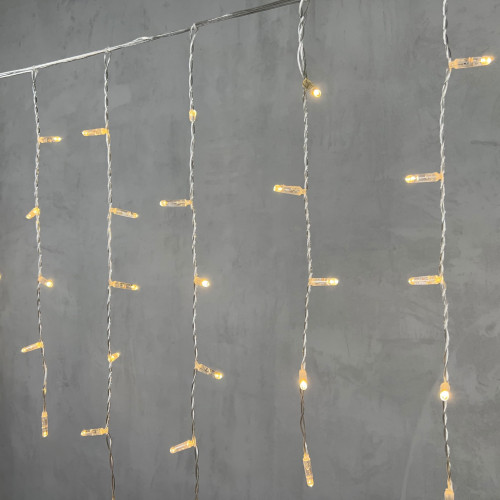 Светодиодная бахрома с колпачком 3,2*0,9 м., 180 теплых белых LED ламп, прозрачный провод ПВХ, IP65, LTC (PIL180CAP-10-2WW)