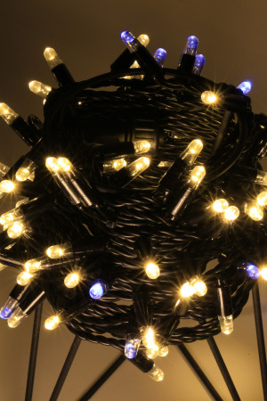 Светодиодная нить 100 теплых белых LED ламп, 10 м., 24В, мерцание, черный резиновый провод, Teamprof (TPF-S10CF-24V-RB/WW)