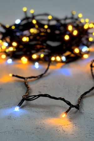 Светодиодная нить 100 желтых LED ламп с мерцанием, 10 м., 24В., черный провод ПВХ, LTC (PST100BLW-11-1Y)